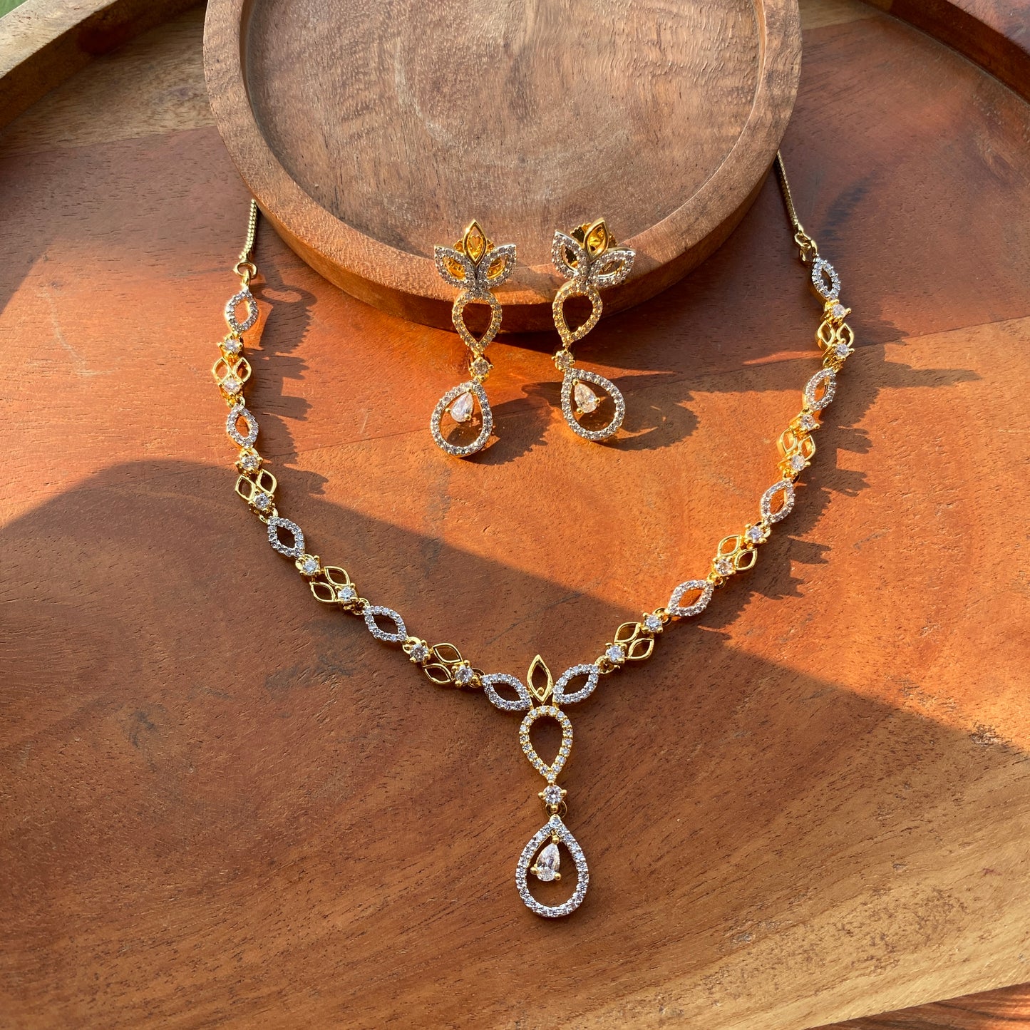 Sleek Almond & Drop Shaped Designer CZ/AD Gold Necklace Set