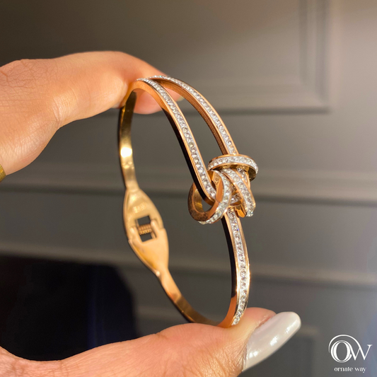 Knotted Rose Gold Bangle Bracelet with Diamonds