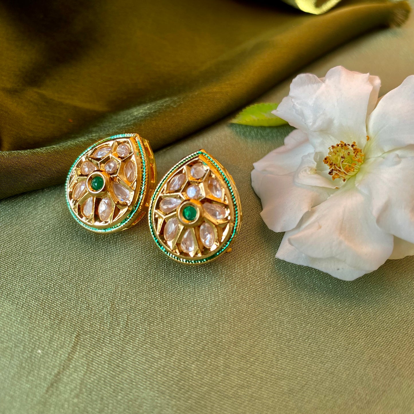 Drop Shaped Kundan Ethnic Studs in Gold with Green Stone