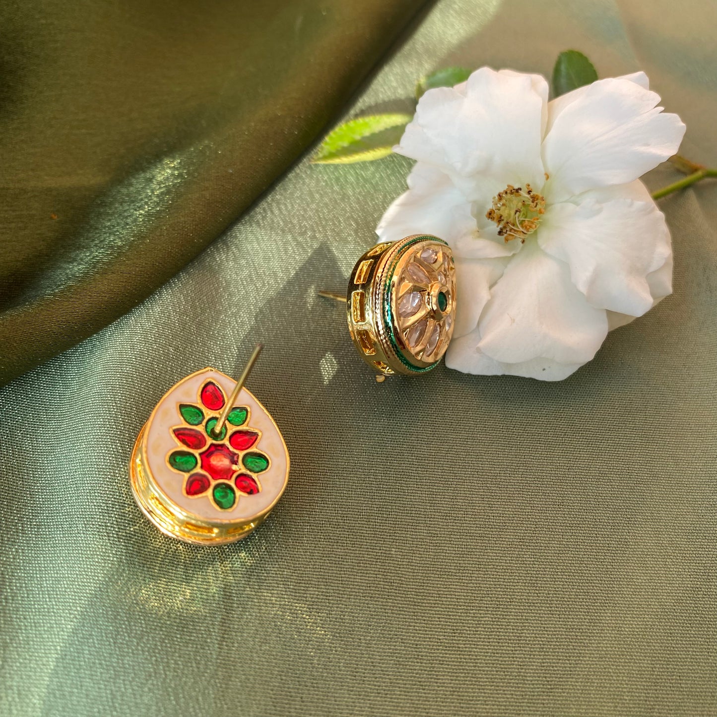 Drop Shaped Kundan Ethnic Studs in Gold with Green Stone