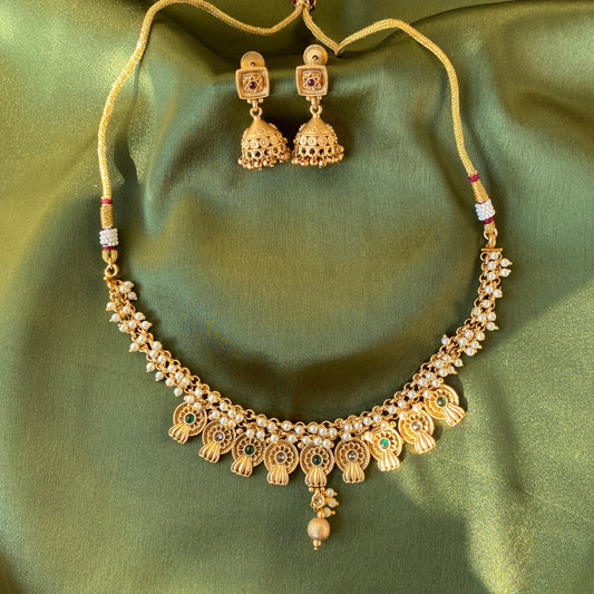 Gold Toned Necklace Set With White and Gold Beads