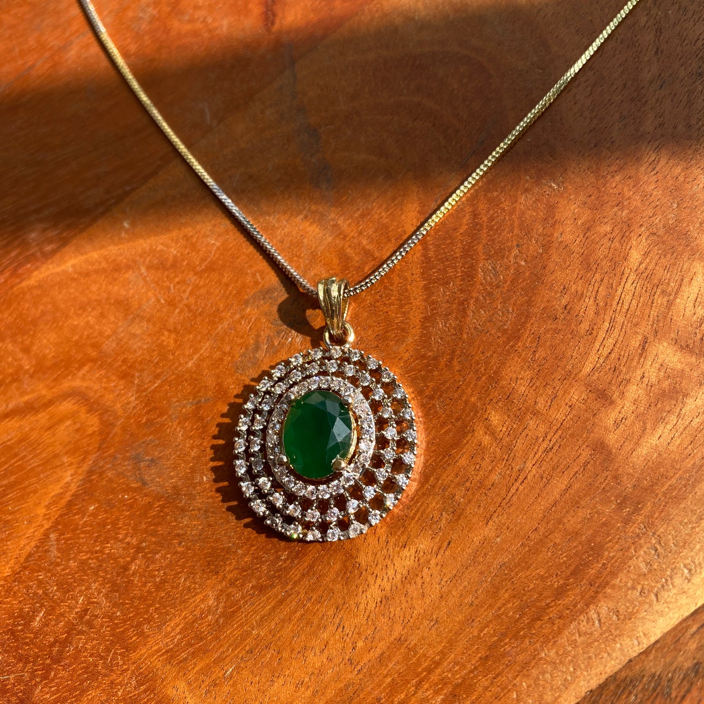 Elegant Golden and Silver Toned CZ Pendant Set with Green Stone (With Chain)